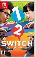 Cover of the Nintendo Switch game "1-2-Switch" by Nintendo. The upper half shows two people holding Joy-Con controllers, facing each other, ready for a party game. The lower half features two people dressed in cowboy attire, pointing fingers like guns at each other. The colorful background highlights the game's title in bold white letters.