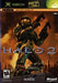 Cover art of the Everything Games product "Halo 2" showcases Master Chief, in his signature green armor, dual-wielding weapons against a fiery, war-torn backdrop. The title "HALO 2" stands out in metallic lettering. Rated "M for Mature," with logos for Bungie and Xbox Live clearly visible.
