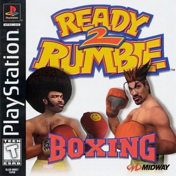 The "Ready 2 Rumble Boxing" cover for PlayStation 1 features two cartoonish boxers: one with an afro and red gloves, the other with spiky hair and orange gloves. Bold letters display the game's title, flanked by the PlayStation and Midway logos.