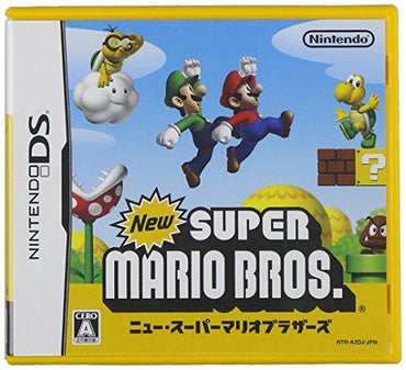 Official cover of "New Super Mario Bros JP" for Nintendo DS by Nintendo. Shows Mario and Luigi jumping against a blue sky with a brick block. Lakitu hovers top left; Goomba is on the right. The game title is boldly displayed at the bottom.