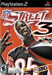 The "NFL Street 3" cover art on PlayStation 2 captures the gritty essence of street football. A player wearing a black and orange jersey holds a football, flashing three fingers. The vibrant red background highlights the NFL Street logo alongside the EA Sports brand prominently.