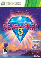 The cover art for PopCap's "Bejeweled 3" on Xbox 360 features a large glowing blue gem against a purple starry background, with the title in bold pink letters and a small badge in the corner noting "Bonus Features.