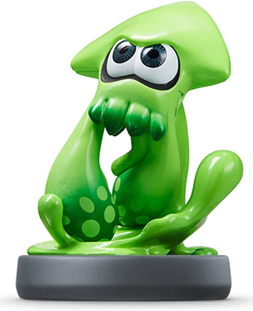 A green Inkling Squid (Green) (Splatoon) from the game Splatoon sits on a gray base, doubling as an amiibo. The squid has large, expressive eyes with a glossy finish, giving it a cute and animated appearance. The tentacles are curled around its body, with lighter green spots enhancing the design for an immersive Nintendo gaming experience.