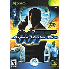 The cover art for the Xbox game "007: Agent Under Fire" features a central silhouette of James Bond holding a gun, surrounded by thrilling scenes including a car chase, a swooping helicopter, and a woman aiming carefully. The iconic 007 logo is prominently featured along with the EA Games brand logo at the bottom. The game is rated T for Teen.