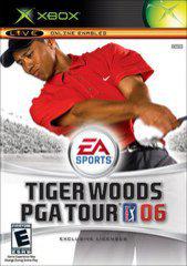 The "Tiger Woods PGA Tour 06" cover on Xbox, designed by EA Sports, shows a golfer in a red shirt swinging a club with a cheering crowd in the backdrop. The game's "E for Everyone" rating ensures accessible championship golf simulation fun.