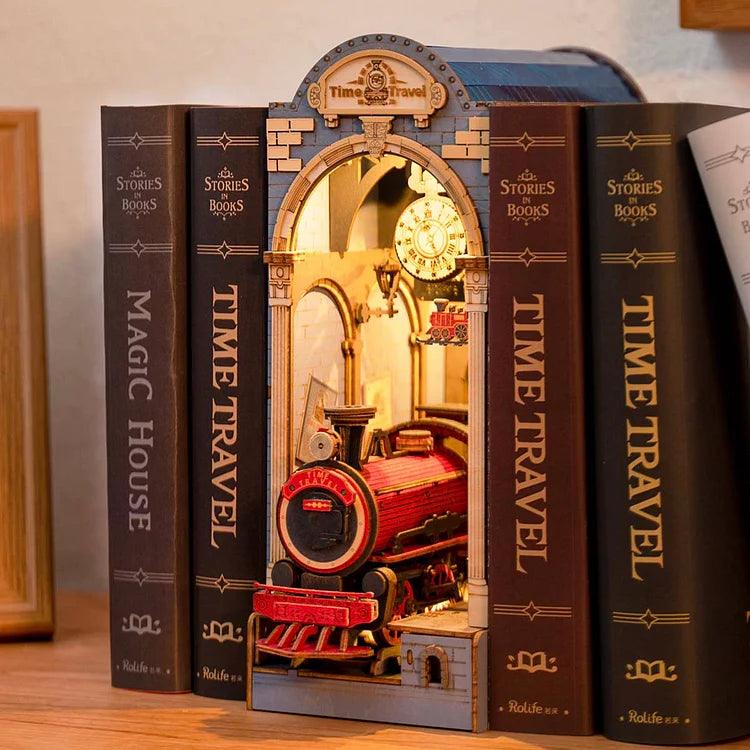 This DIY Rolife Time Travel 3D Creative Bookend features a whimsical nook with a mini red steam locomotive in a brick archway, warmly lit. Books such as "Stories & Books," "Magic House," and "Time Travel" add to the nostalgic charm on your decorative bookshelf.