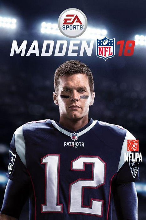 Cover of the football simulation game "Madden 18" with the Everything Games logo at the top. A football player wearing a New England Patriots jersey with number 12 is in the center. NFL and NFLPA logos are also visible, along with a nod to its Longshot story mode. The background features bright stadium lights against a dark backdrop.