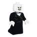 A Little Shop of Magic LEGO Harry Potter: Lord Voldemort Plush Minifigure resembling a white, bald-headed character with a menacing expression featuring yellow eyes and sharp teeth. The figure is dressed in a black robe with green detailing across the chest, and white hands, creating an overall eerie appearance reminiscent of the dark magic from the Harry Potter books.