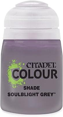 An image depicts a Citadel Shade - Soulblight Grey pot, ideal for miniatures. It has a grey label with a green splatter design, a transparent lid, and bold black "CITADEL COLOUR" and "SHADE SOULBLIGHT GREY" text. Perfect for matte shading.