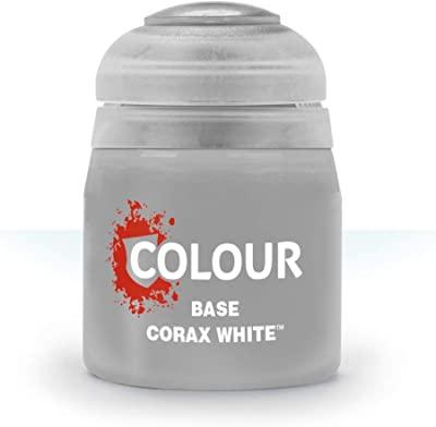 An image of a gray cylindrical paint bottle with a dome-shaped cap. The label reads "Citadel Base - Corax White" with a red splash design around the word "COLOUR." This Citadel Base paint, perfect for basecoating, features a slightly transparent cap, and the background is white with a shadow under the bottle.