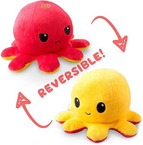 Two plush octopus toys are depicted. The toy on top has a red body and an angry face, while the one on the bottom is yellow with a happy face. Curved arrows and the word "REVERSIBLE!" indicate that this Everything Games TeeTurtle BIG Reversible Red and Yellow Octopus Plushie can be flipped to change between the two expressions.