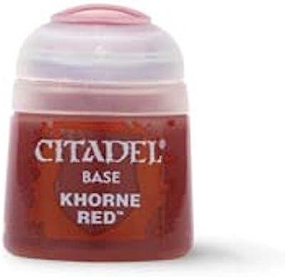 The image shows a small paint pot of Citadel Base - Khorne Red by Citadel. The pot is cylindrical with a dome-shaped lid, which is partially transparent revealing a hint of the paint inside. The label features the Citadel logo in white, along with the text "BASE KHORNE RED™," perfect for basecoating.