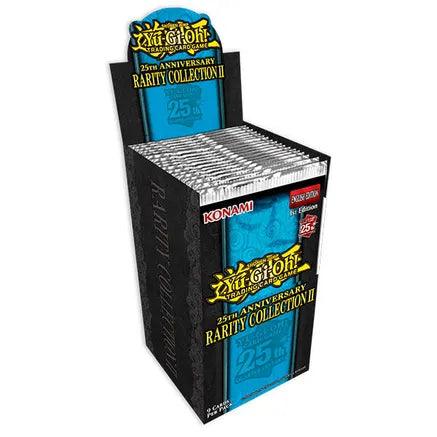 A vertically standing display box contains several packs of "Yu-Gi-Oh! 25th Anniversary Rarity Collection II Booster Box." The black box, adorned with the Yu-Gi-Oh! logo and Konami branding, proudly celebrates the 25th anniversary. Inside, blue packs feature similar branding and luxury rares text.