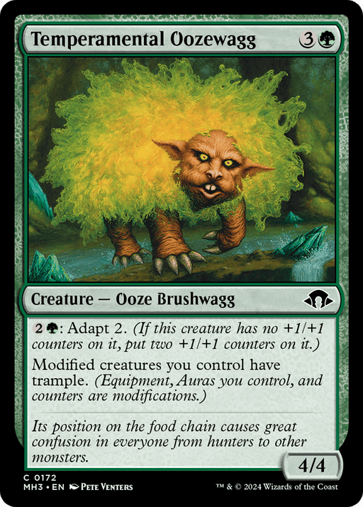 Temperamental Oozewagg [Modern Horizons 3]," a 4/4 creature from Magic: The Gathering, costs 3 generic and 1 green mana. This Creature Ooze Brushwagg, illustrated as a snarling, furry green bush, features Adapt 2 and can grant trample to modified creatures.