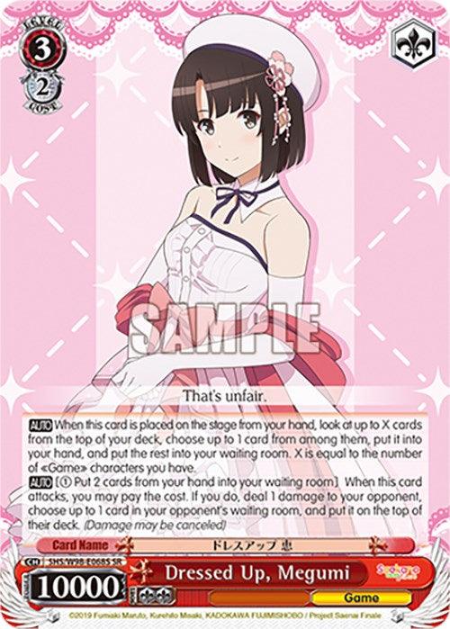 The image showcases a trading card featuring a dark-haired anime girl from "Saekano the Movie: Finale," wearing a white dress with a red ribbon around her neck and a purple bow in her hair. The top of the card reads "Game" and "Dressed Up, Megumi." This Super Rare card includes Japanese and English text detailing its abilities and stats. The product is named Dressed Up, Megumi (SHS/W98-E068S SR) [Saekano the Movie: Finale] by Bushiroad.