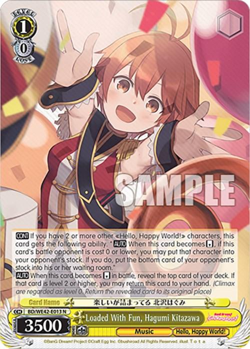 A trading card featuring an anime-style girl named Hagumi Kitazawa from the series "Hello, Happy World!" The colorful background bursts with swirls and lights. Text details her stats and abilities, including a power of 3500. Prominently displayed at the bottom are the words "Loaded With Fun, Hagumi Kitazawa (BD/WE42-E013 N) [BanG Dream! Girls Band Party! Countdown Collection] by Bushiroad.