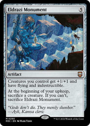 A Magic: The Gathering card named "Eldrazi Monument [Modern Horizons 3 Commander]." The illustration depicts a colossal, blue-toned statue with abstract, angular designs, looming over a desolate, rocky landscape. In the background, a figure holds a staff with glowing light. This Mythic Artifact's text details its powerful abilities and evocative flavor text.