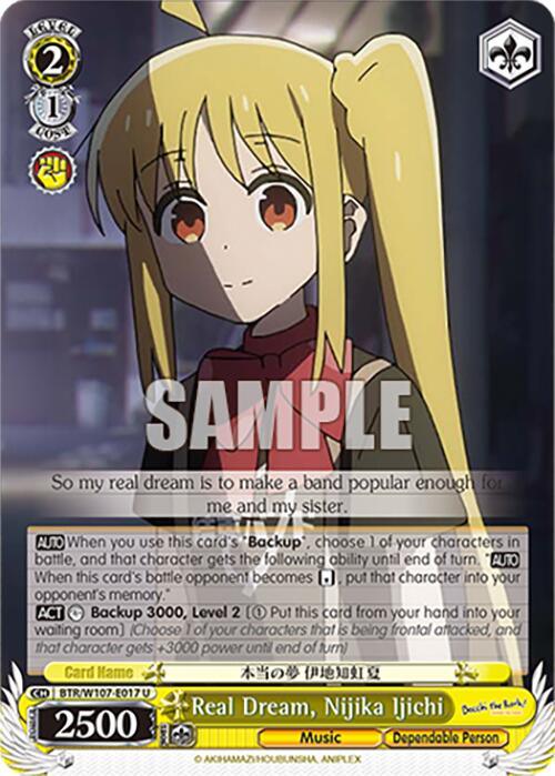 The collectible trading card, Bushiroad's Real Dream, Nijika Ijichi (BTR/W107-E017 U) [BOCCHI THE ROCK!], features an uncommon character from BOCCHI THE ROCK!, showcasing an anime girl with long blonde hair in twin ponytails, wearing a red jacket over a white shirt. Named 