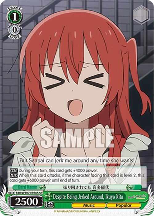 A Bushiroad Despite Being Jerked Around, Ikuyo Kita (BTR/W107-E056S SR) [BOCCHI THE ROCK!] trading card featuring a red-haired anime girl with an open mouth, likely speaking or singing. She has a cheerful expression with eyes closed. Text at the bottom reads: 