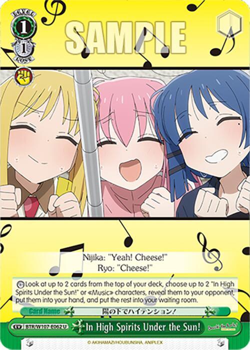 A card featuring three cheerful anime girls from BOCCHI THE ROCK! The blonde girl in a yellow cardigan, the pink-haired girl in a grey uniform with a pole, and the blue-haired girl in a blue dress. The background is yellow with musical notes. This uncommon card includes their names and dialogue, "Yeah! Cheese!" and "Cheese!". Product Name: In High Spirits Under the Sun! (BTR/W107-E062 U) [BOCCHI THE ROCK!] Brand Name: Bushiroad