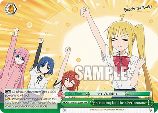 An animated card image titled "Preparing for Their Performance (BTR/W107-E066R RRR) [BOCCHI THE ROCK!]" from Bushiroad features four female characters in school uniforms striking dynamic poses with fists raised in the air, smiling enthusiastically. Text on the card provides a power boost and a climax soul trigger for game mechanics.