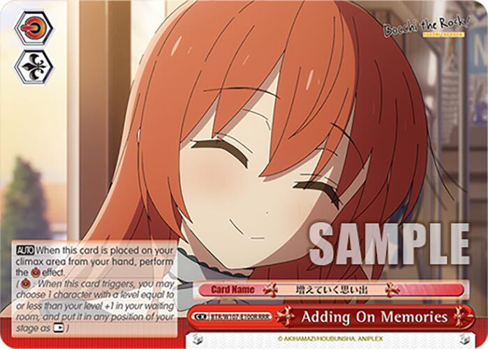 A trading card features an anime-style character with long reddish-orange hair, smiling with closed eyes. She dons a high-collar outfit. The card includes a description box with text, a label "Triple Rare," and icons on the top left corner. The background shows a slightly blurred indoor setting. This is the Adding On Memories (BTR/W107-E100R RRR) [BOCCHI THE ROCK!] card from Bushiroad.