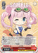 A collectible card from the game "Omiko City" featuring a chibi-style character named Chibi Reo [Ayakashi Triangle] by Bushiroad. The Exorcist Ninja has pink hair, pink eyes, and is winking with a playful expression. She is wearing a blue top and goggles on her head. The card includes various stats and abilities.