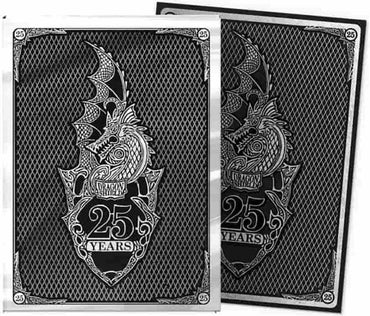 Two overlapping black and white trading cards showcase intricate dragon designs, akin to Dragon Shield matte art sleeves by Arcane Tinmen. Each features a stylized dragon inside a shield with "DRAGON SHIELD" and "25 YEARS" text. Ornate borders include lattice patterns with "25" in the corners.