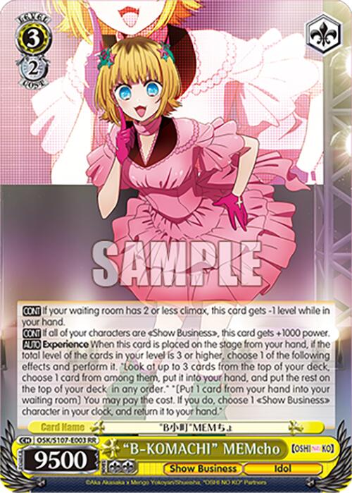 A Double Rare "Weiß Schwarz" trading card called "B-KOMACHI" MEMcho (OSK/S107-E003 RR) from the OSHI NO KO series, produced by Bushiroad. This card features MEMcho, adorned with her blonde hair, a pink frilly dress, and a matching microphone. MEMcho boasts 9500 power and various abilities detailed below her image and stats. The word "SAMPLE" is overlaid on the card.