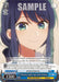 The trading card, "Performing Together Again, Akane Kurokawa (OSK/S107-E077S SR)" from Bushiroad's [[OSHI NO KO]] series, features an anime-style illustration of a young woman with long blue hair and blue eyes. She is smiling softly and looking to the left. This Super Rare Character Card showcases various stats and abilities, including a power level of 1500, with the name “Akane Kurokawa” at the bottom.