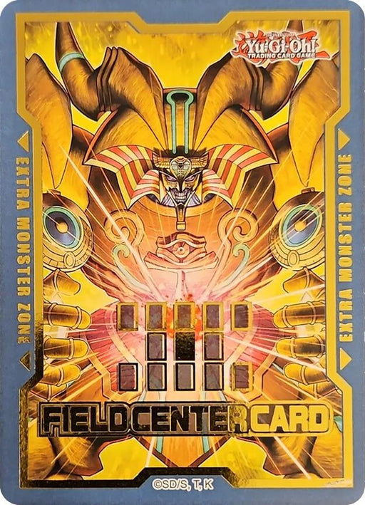 The Field Center Token: The Unstoppable Exodia Incarnate (Infinite Forbidden) Promo from Yu-Gi-Oh! showcases a vibrant and detailed design, featuring an Egyptian-themed motif centered around a gold, intricately designed sarcophagus-like face with glowing eyes, surrounded by colorful geometric patterns.