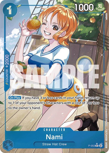 The Bandai Premium Booster -The Best- features the full art Nami (P-053) anime card, depicting her winking with an orange. Dressed in an orange and blue top with white shorts, this card includes game stats: cost 1, power 1000, "Counter +2000," and "On Play" abilities.