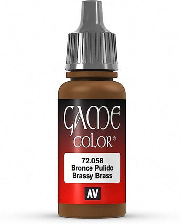 A small, cylindrical bottle with a gray dropper cap is shown against a white background. The bottle is labeled "Everything Games" and has an ombre effect from dark brown at the top, transitioning to red, then white at the bottom. This highly pigmented acrylic color is perfect for painting fantasy figures. The label reads "Vallejo Game Color Brassy Brass Paint, 17ml" with the AV