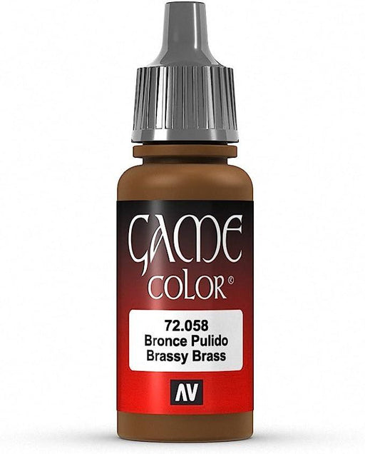 A small, cylindrical bottle with a gray dropper cap is shown against a white background. The bottle is labeled "Everything Games" and has an ombre effect from dark brown at the top, transitioning to red, then white at the bottom. This highly pigmented acrylic color is perfect for painting fantasy figures. The label reads "Vallejo Game Color Brassy Brass Paint, 17ml" with the AV
