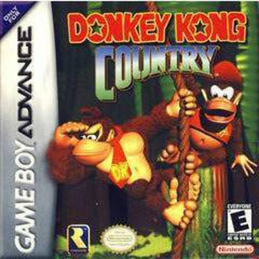 The cover of "Donkey King Country" for Game Boy Advance features Donkey Kong and Diddy Kong swinging through a vibrant jungle, offering an exciting platforming experience. The Game Boy Advance logo is on the left amid lush foliage, with the title boldly displayed at the top. Rated "E" by Everything Games.