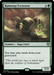 A Magic: The Gathering card depicts "Ramunap Excavator [Outlaws of Thunder Junction Commander]," a rare creature card featuring a snake-like naga cleric in a desolate desert scene. Aligned with the game's green mana, the card's details and borders are unmistakably green, and the creature's power and toughness are 2/3.