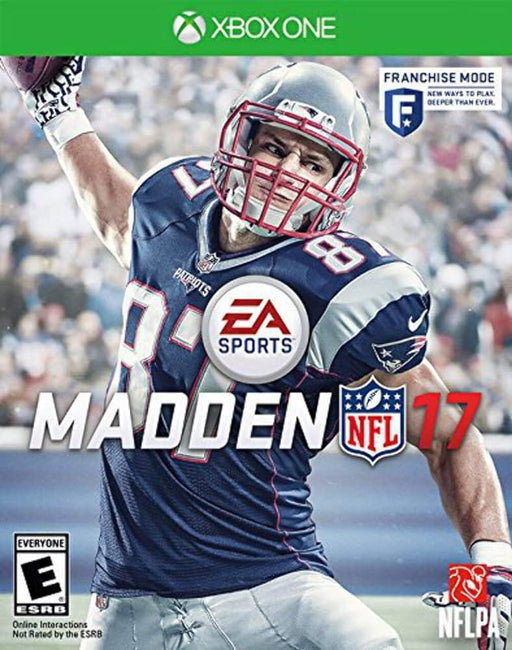 Cover of the football simulation game Madden 17 for Xbox One. The cover features a football player in a Patriots uniform mid-action, wearing number 87. The EA Sports logo is prominently displayed above the game's title. The NFL and NFLPA logos are also visible. The game is rated E for Everyone by Everything Games.