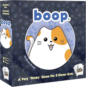 The image displays the game box "boop." by Smirk & Dagger Games, with a smiling round cat illustration. It's called "A Very 'Thinky' Game For 2 Clever Cats," featuring cat pieces on a quilted board, suitable for ages 10+, lasting 20-30 minutes, created by Scott Brady.