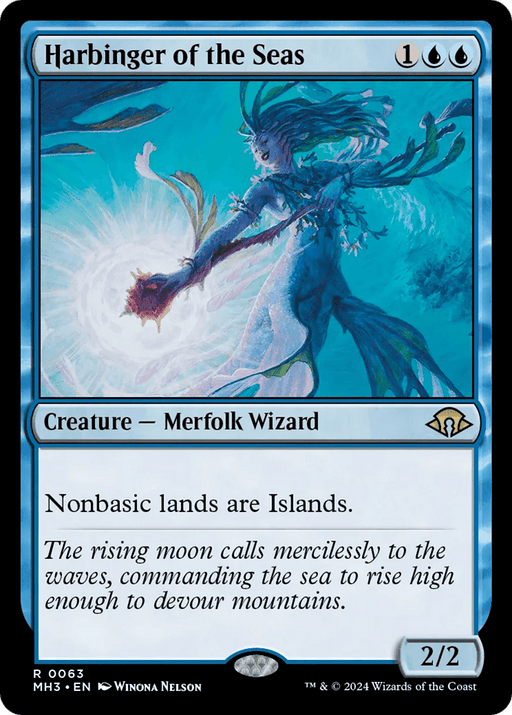 A Magic: The Gathering card from Modern Horizons 3 titled Harbinger of the Seas [Modern Horizons 3]. It depicts a merfolk wizard with blue skin and aquatic elements. The card has a blue frame, costs 1UU, and is a 2/2 creature that transforms nonbasic lands into Islands. Flavor text: "The rising moon calls mercilessly to the waves...