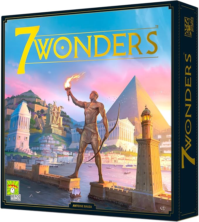 Box cover of Repos Production's award-winning "7 Wonders," depicting a Greek statue with a torch and bow. The background features ancient wonders like a pyramid, historical buildings, and a lighthouse at sunset under pink and blue skies.