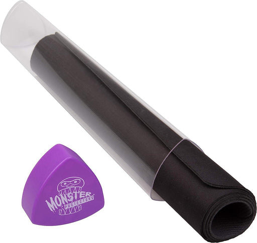 A rolled black fabric or mat is inside a clear plastic tube, showcasing its durable construction. Positioned next to it is a purple triangular plastic object with white text and a cartoonish face logo that reads "Monster Protectors." This unique Monster TCG Gaming Prism Playmat Tube (Purple) by Monster stands out against the plain white background.