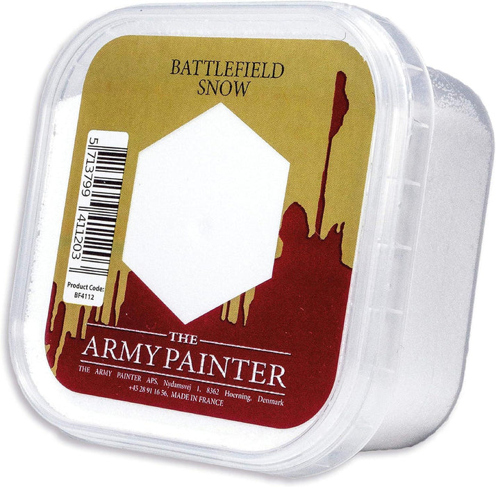 A small plastic container with a clear lid labeled "ARMY PAINTER" in white text on a red background. The product, called "The Army Painter Battlefield: Snow Medium," is perfect for giving miniatures a realistic look of winter base. It’s filled with a white powdery substance, and there's a barcode and product code sticker on the side.