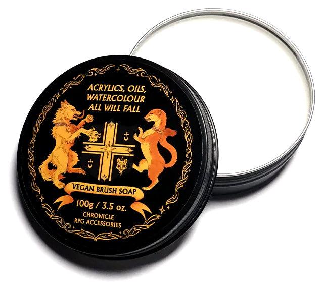 Round black tin labeled 