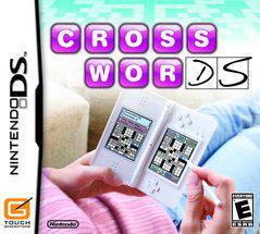 Cover of the Nintendo puzzle game "Crosswords DS" with a person holding a DS console showing crosswords on both screens. The background is blurred, emphasizing the bold game title above. Rated E for Everyone by Nintendo.