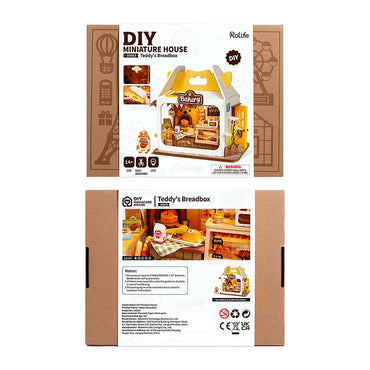 The DIY Miniature House set, "Teddy's Breadbox" by Robotime, features a charming breadbox-shaped bakery on the front, ideal for table decor with miniature bread items. The back includes assembly instructions and detailed images, perfect for pretend play games.