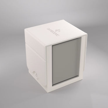 A white, rectangular, textured box labeled "GameGenic" on the top surface. Resembling a premium deck box for Magic: The Gathering™, it is named the "SQUIRE PLUS 100+ XL CONVERTIBLE - WHITE" and features a transparent window on one side, offering a glimpse of the contents inside. The design is sleek and minimalistic, with clean lines and a modern aesthetic set against a plain light gray background.