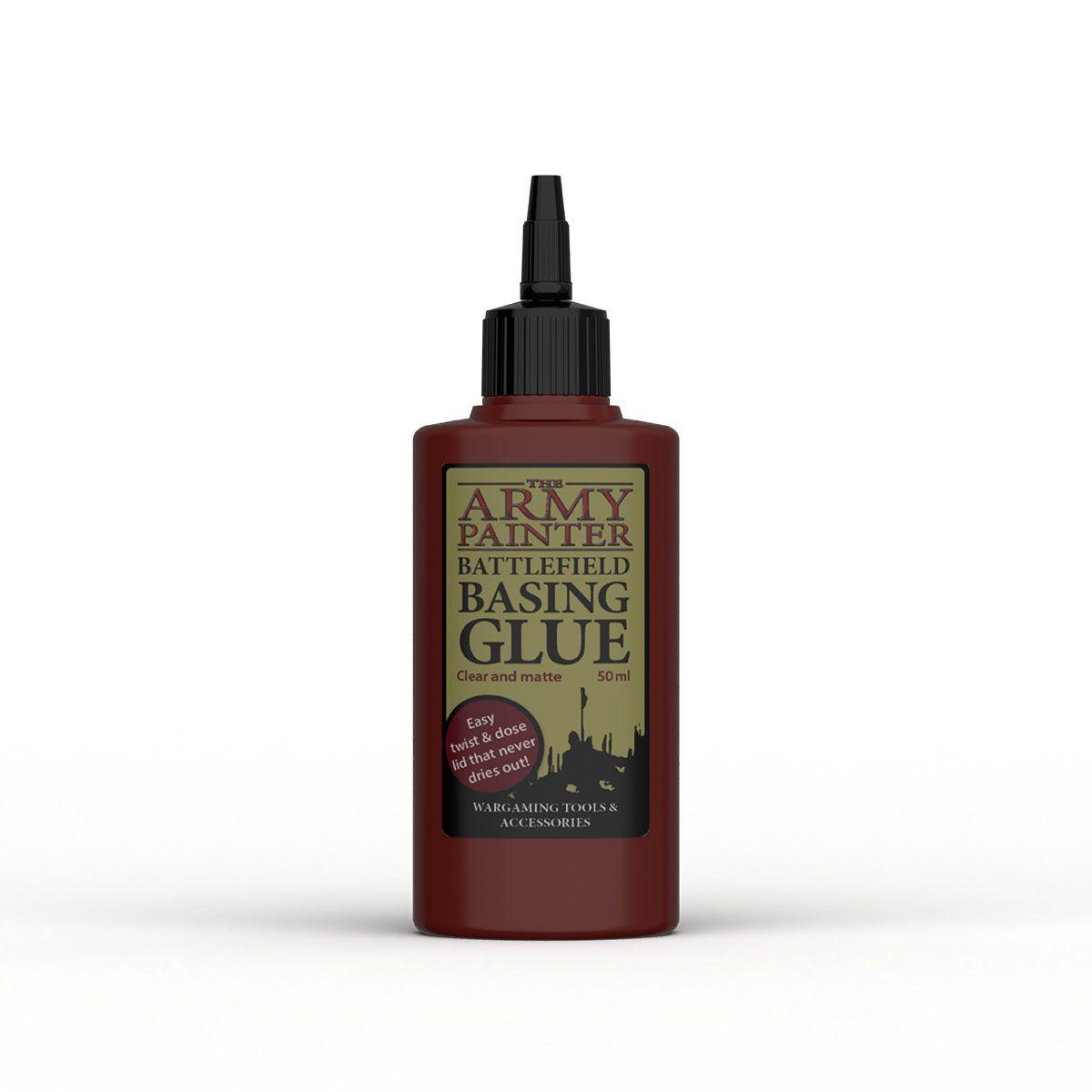 A 50ml bottle of Army Painter Army Paint Basing Glue with a black twist cap. The label features a greenish-gold background that informs it is clear, matte, and non-toxic glue, easy to use, dries fast and doesn't run. Suitable for wargaming, tools, accessories, and gluing polyfoam.