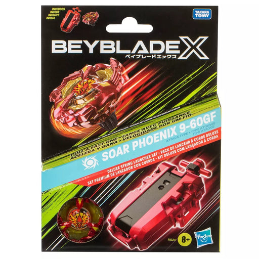 Packaging for Beyblade X's "Soar Phoenix 9-60GF Deluxe String Launcher Set," featuring a red and gold spinning top with the X-Celerator Gear System and a black and red string launcher. The top is depicted in action with motion lines. The text includes the product name, details, age 8+ recommendation, and logos for Hasbro.