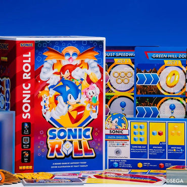 The "Sonic the Hedgehog: Sonic Roll" by Kessler Corporation features iconic scenes like Green Hill Zone on its vibrant box, with game components including Zones Cards and pieces. Hunt for Chaos Emeralds amidst nostalgic SEGA charm and colorful illustrations.