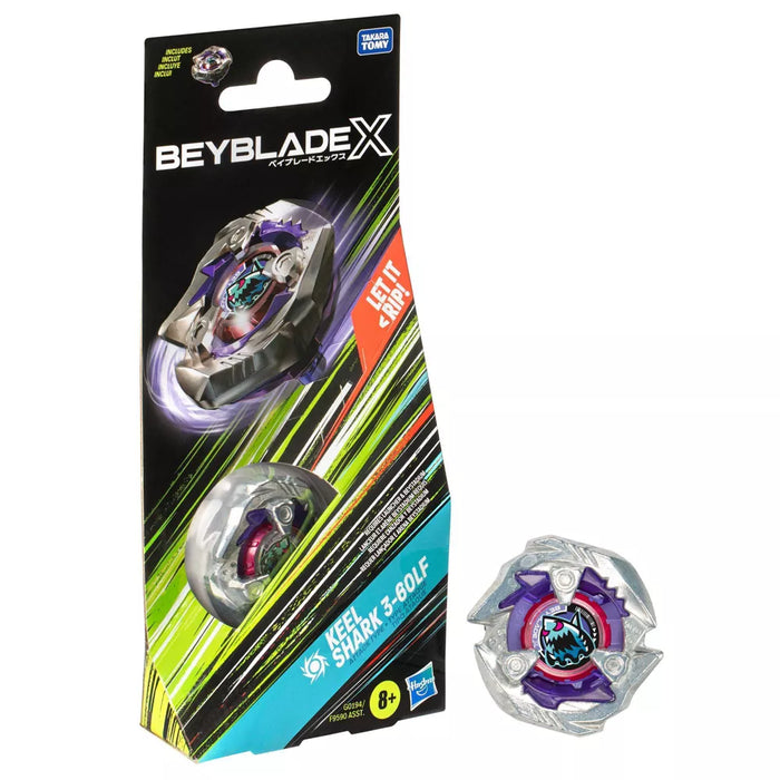 A Beyblade Keel Shark Attack Battle Top toy package featuring the Xiphos Xcalibur B-198 model. The packaging showcases a spinning top with a futuristic design in silver, purple, and red colors. Text on the package includes the Hasbro logo, "Let It Rip!", "Keel Shark 8-3OLF," an introduction to the X-Celerator Gear System, and an age recommendation of 8 years and up.